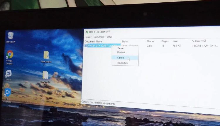 Los trabajos de impresión permanecen en la cola después de imprimirse windows 10